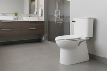 American Standard Aspirations Two-Piece Concealed 1.28 gpf/4.8 Lpf Chair Height Elongated Toilet